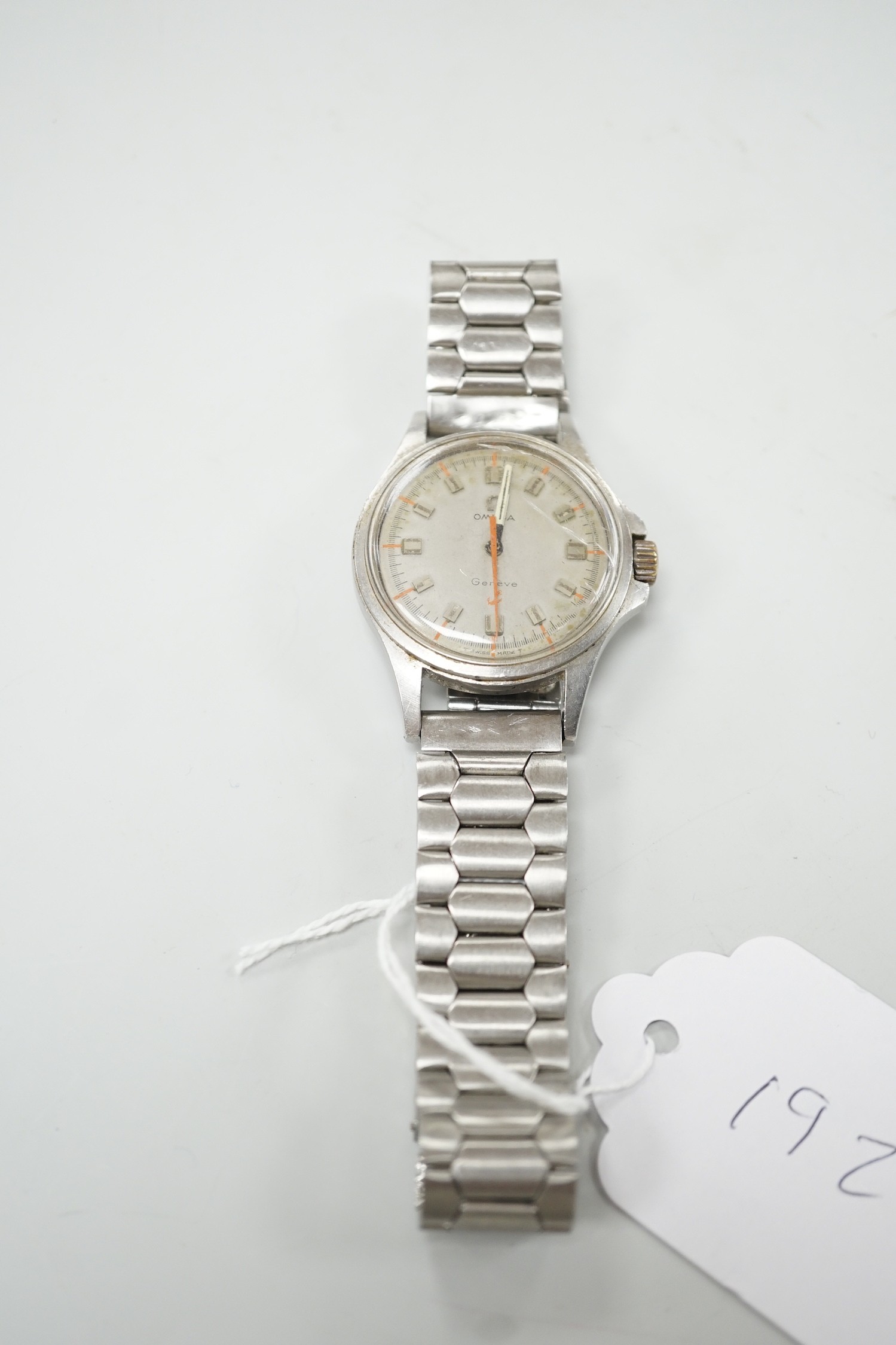 A gentleman's late 1960's stainless steel Omega manual wind wrist watch, movement c.601, case diameter 35mm, with orange sweep seconds, on associated steel bracelet.